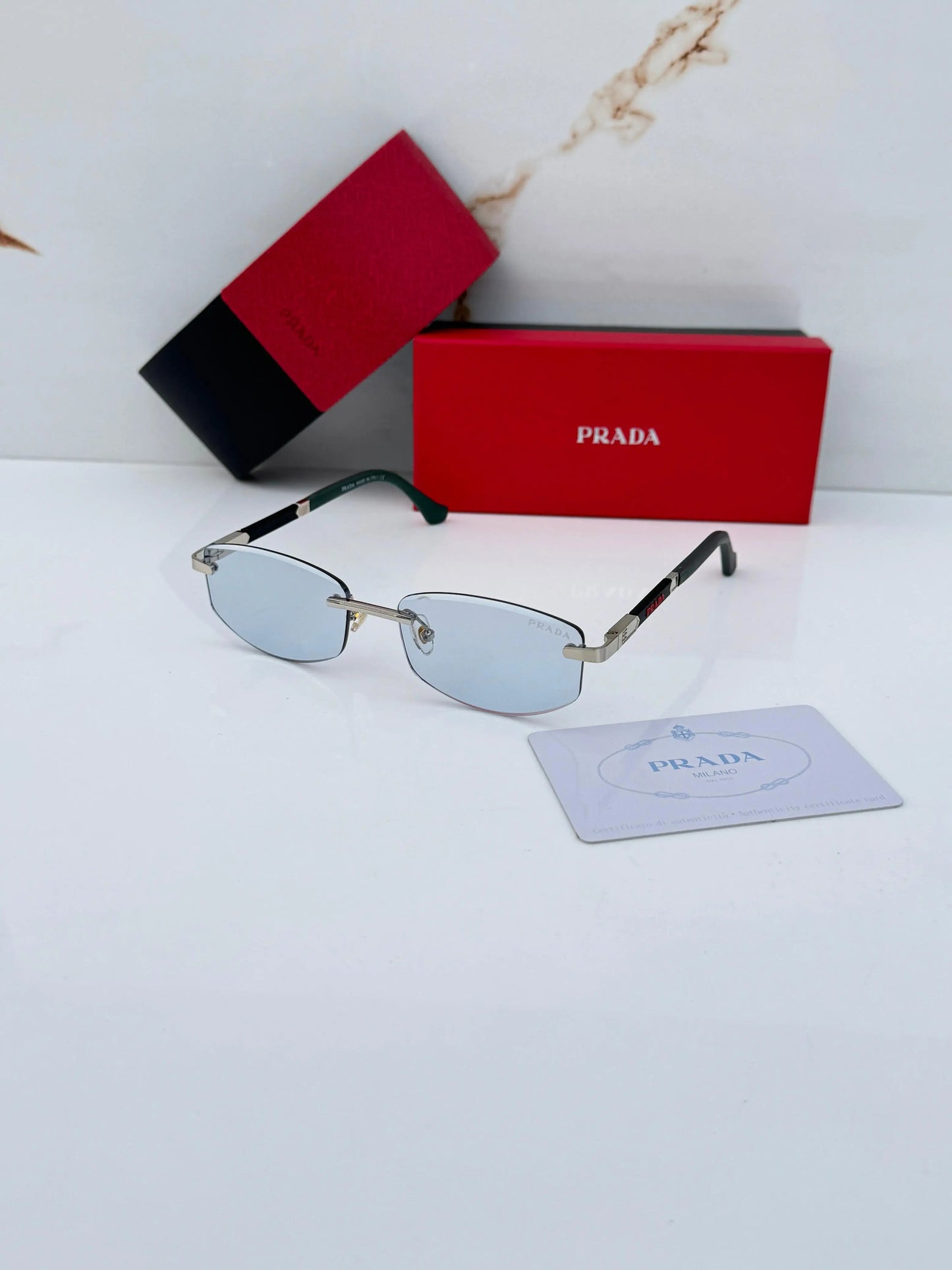 Pr-ada_124_Silver_Blue Rimless Premium Shades