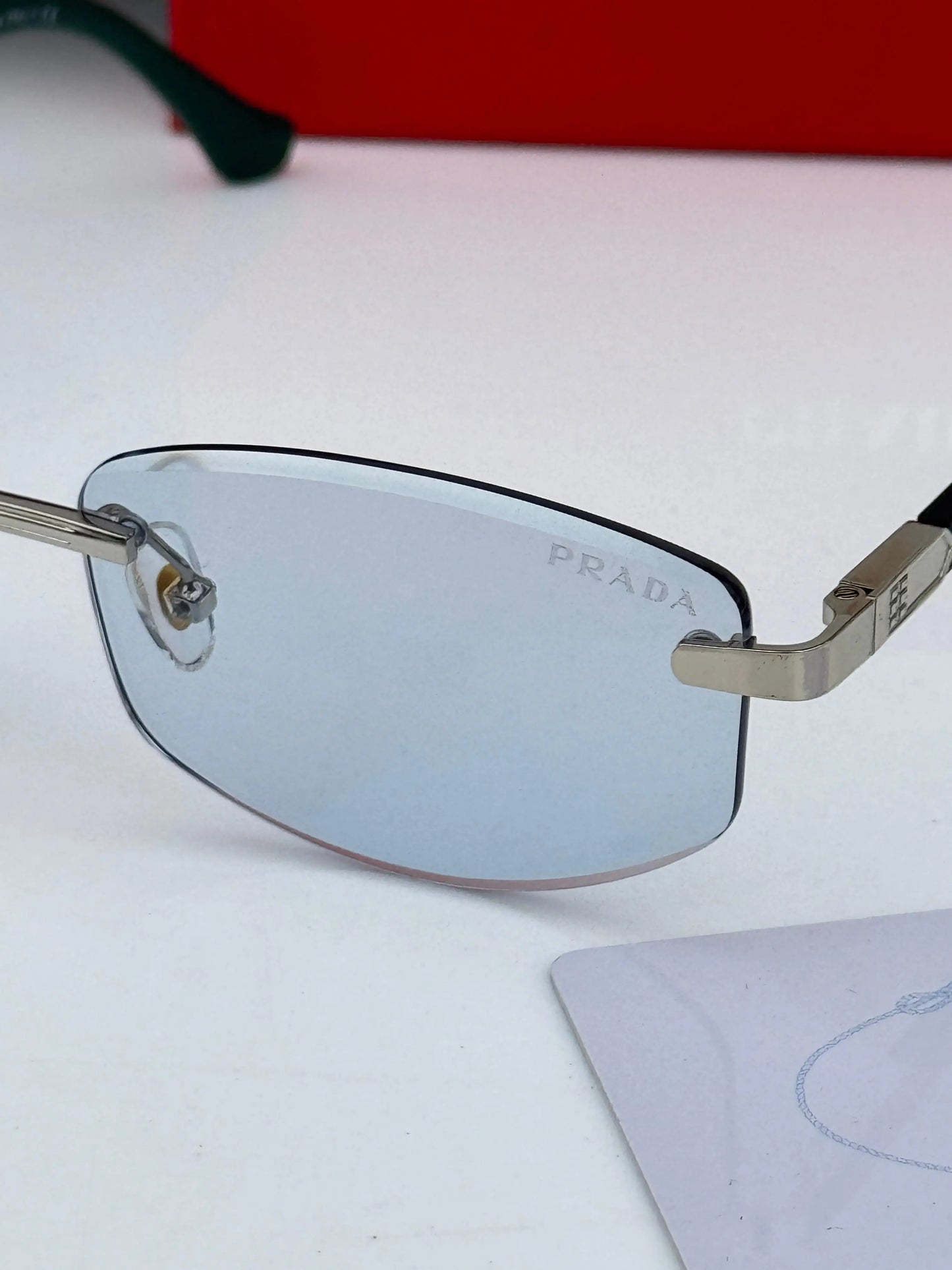 Pr-ada_124_Silver_Blue Rimless Premium Shades
